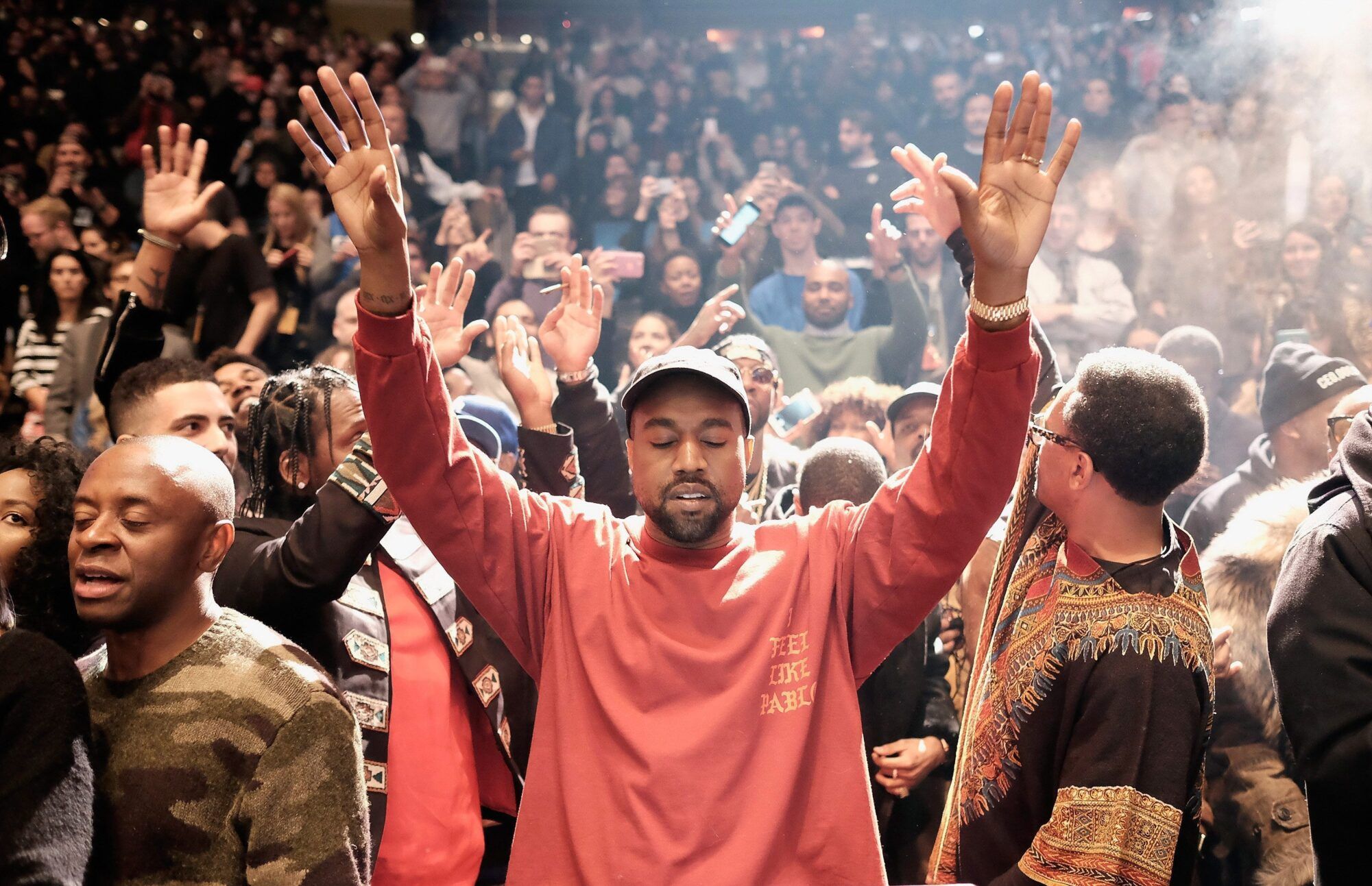 Kanye West praying scaled