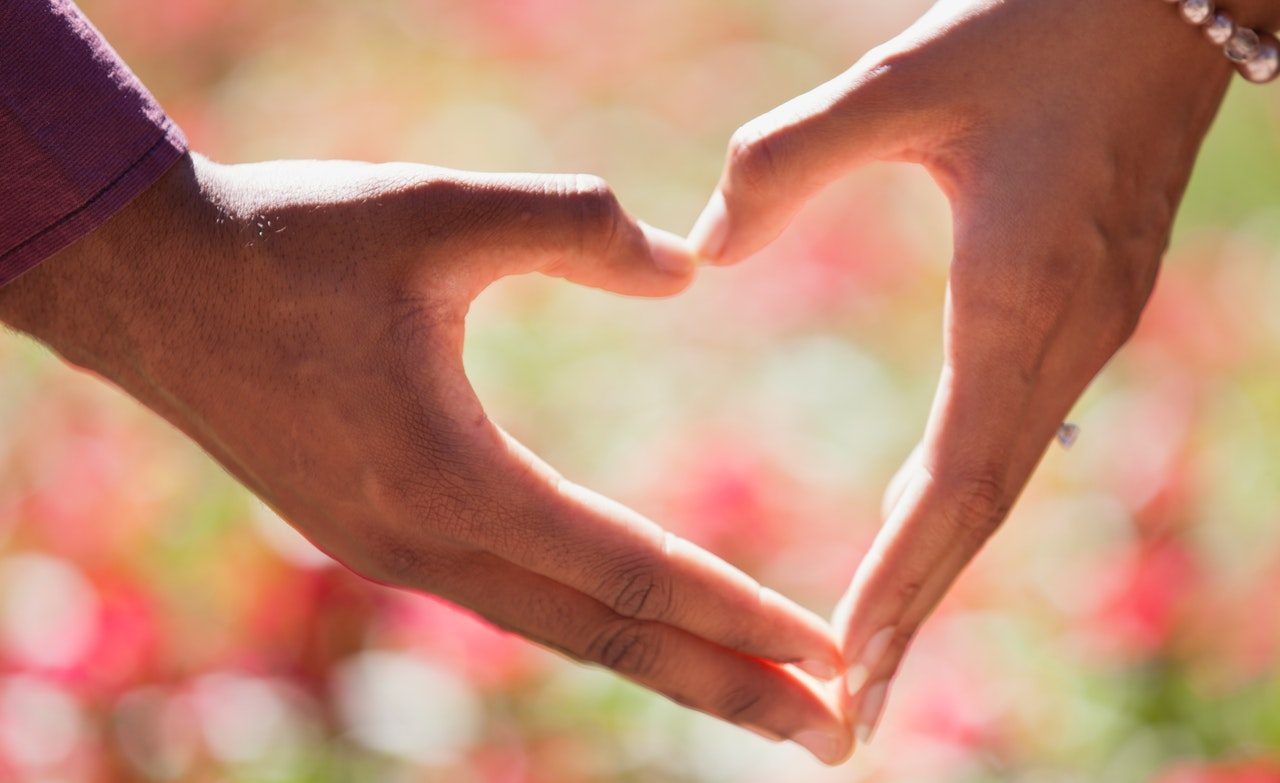 pexels jasmine carter heart hands