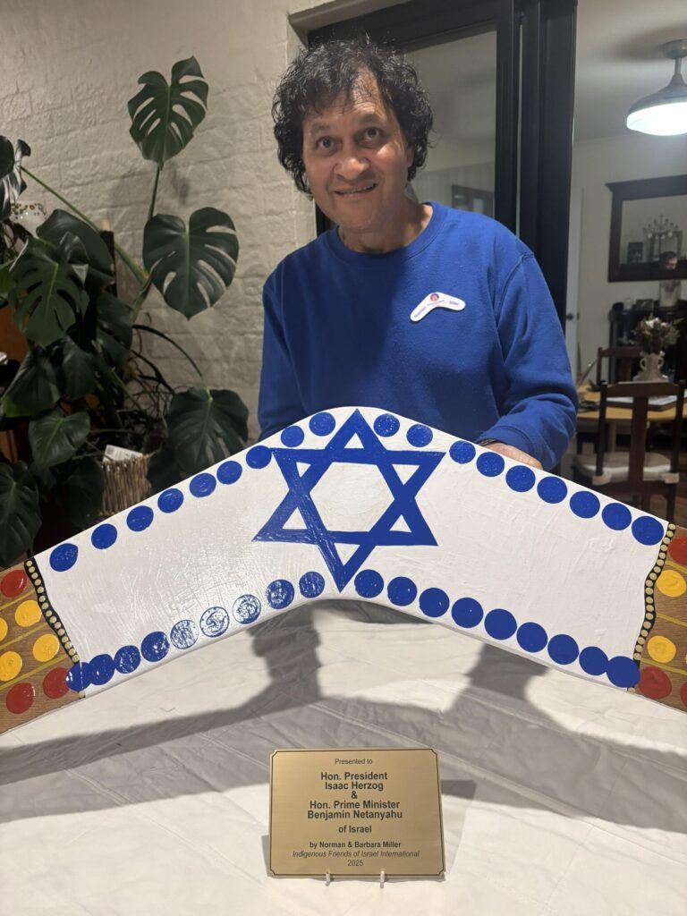 Boomerang and plaque for Israel with Norman Miller