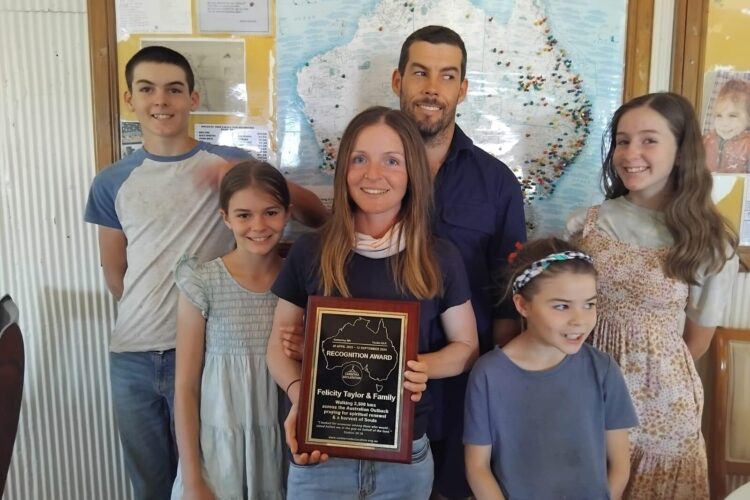 Felicity Nic Taylor Family with Award