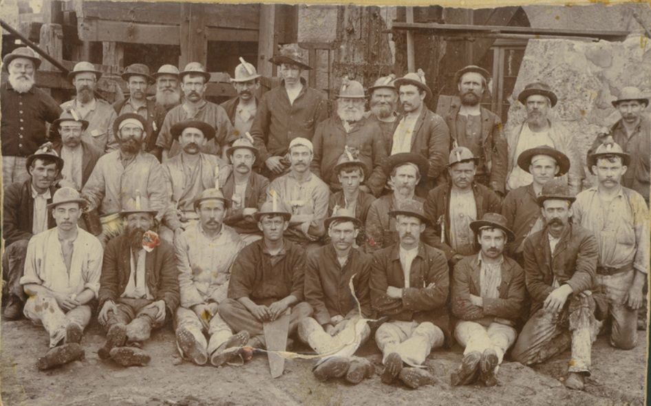 Miners at Moonta with candles on their mining hats circa 1884 (State Library of South Australia)