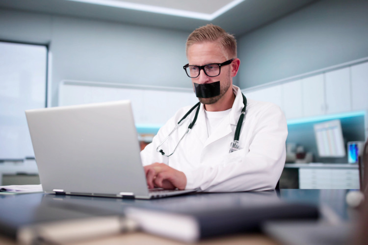 doctor duct-taped Adobe AHPRA Silences Psychiatrist Dr Andrew Amos for Challenging Child ‘Gender Medicine’