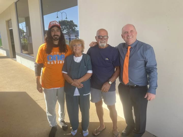 One Nation Victoria candidate for Nepean, Darren Hercus, with voters at the pre-polling centre. Picture: Facebook.